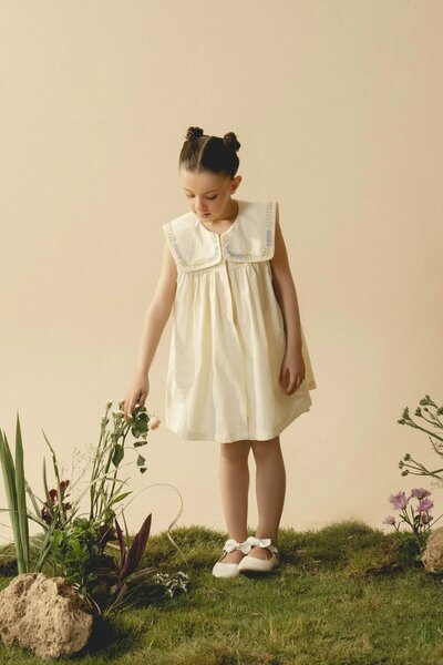 Cecile | Cream pleated dress with hand-embroidered collar