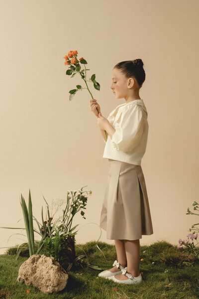 Fauna Skirt | Cotton denim pleated skirt with tailored A-line silhouette