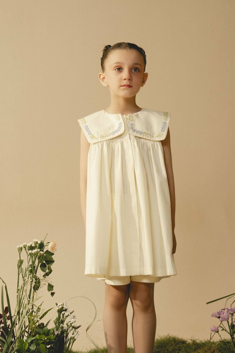 Cecile | Cream pleated dress with hand-embroidered collar