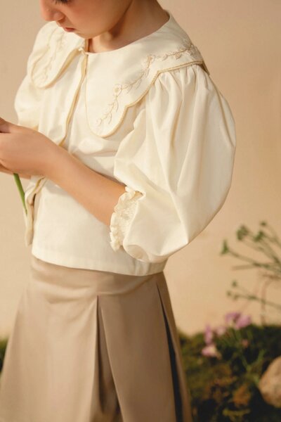 Fauna Skirt | Cotton denim pleated skirt with tailored A-line silhouette