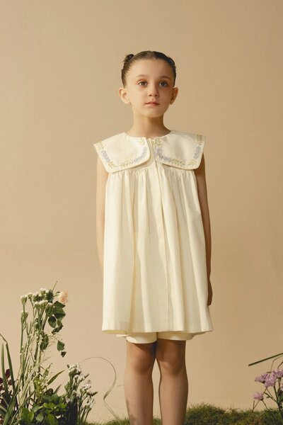 Cecile | Cream pleated dress with hand-embroidered collar